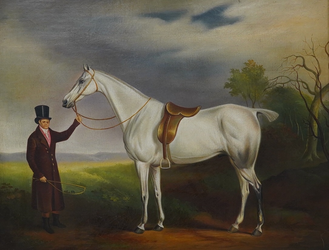 An early 19th century style oil on canvas, Study of a gentleman and saddled horse before a landscape, 39.5 x 49cm. Condition - fair to good